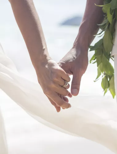 Close up of a couple holding hands